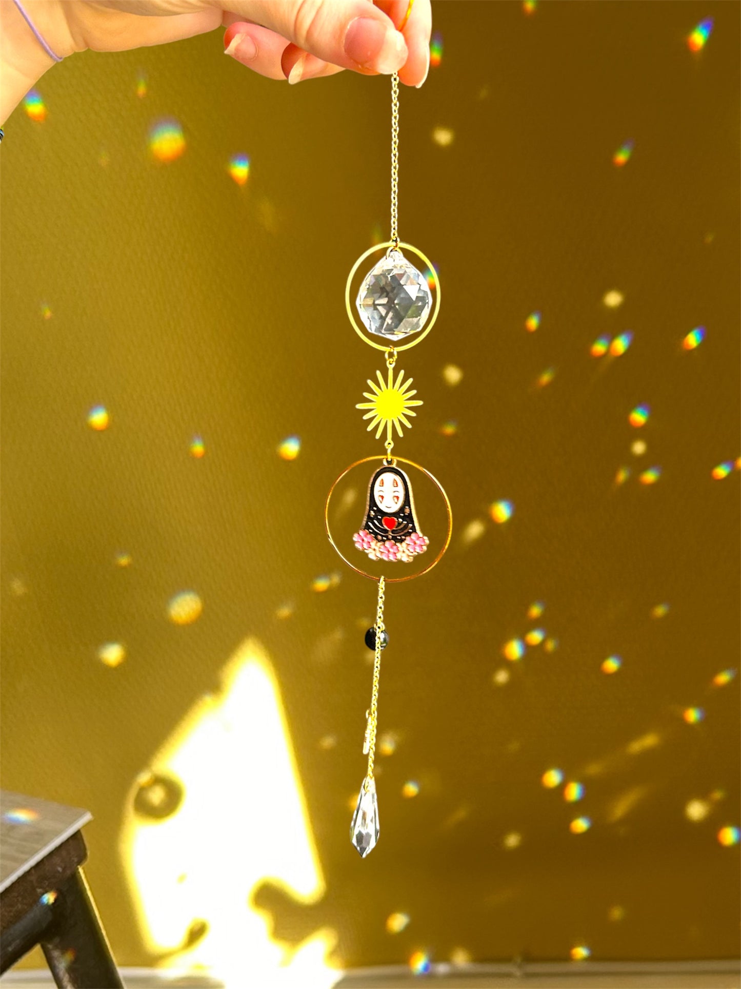 Suncatcher Sans visage’s World